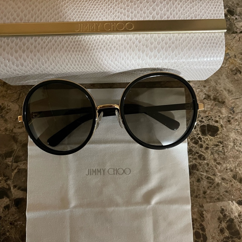 SOLD!!! Jimmy Choo Women's Sunglasses. No scratches/ defects. Only worn once.